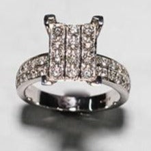 9ct White Gold Emerald Shaped Diamond Illusion Set Ring with Diamond Set Shoulders